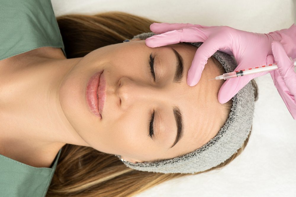 Close-up,Of,The,Hands,Of,An,Expert,Cosmetologist,Injecting,Botox Close-up,Of,The,Hands,Of,An,Expert,Cosmetologist,Injecting,Botox